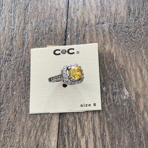Silver and Yellow Gemstone Ring